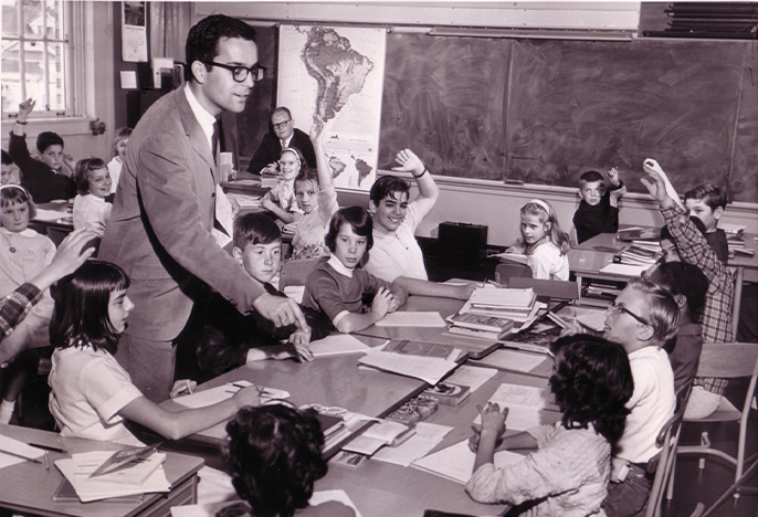 Male teacher in elementary classroom circa 1964